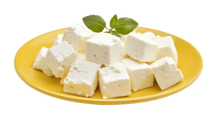 Feta cheese on a yellow plate on a transparent background. isolated background.