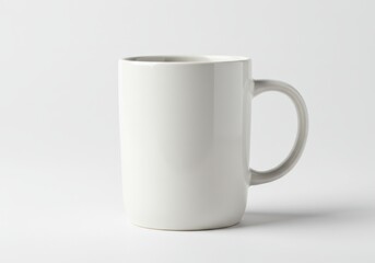 Fototapeta premium A clean and simple white ceramic coffee mug with a smooth finish and a sturdy handle isolated on white background