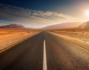 Empty straight asphalt road in the desert
