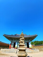Naklejka premium Naksansa Korean Buddhist Temple Complex gold pagoda in Yangyang, South Korea.