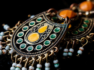 Abstract Jewelry Decorations in Macro Photography: Detailed elements that play with shapes and colors, perfect for art and design.