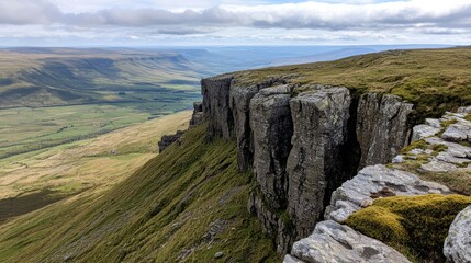 High cliff overlooking vast valley