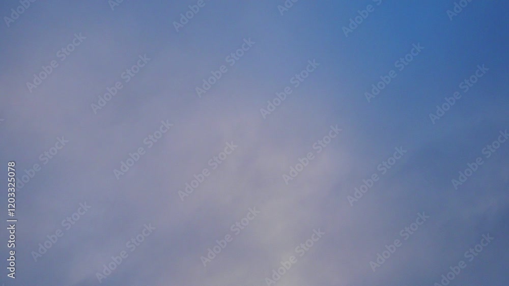 Poster observe dynamic flow of clouds against a vibrant blue sky, real time capture. experience gradual shi