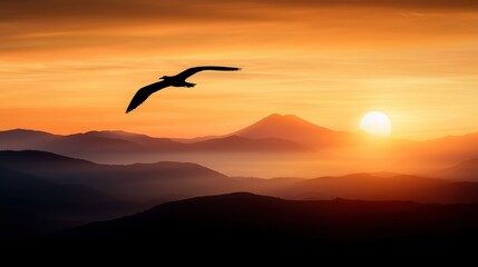 A bird flying over a mountain range at sunset