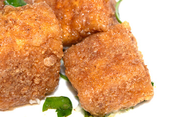 Well Season Batter Fried Tofu Chunks on White Background