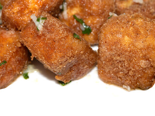 Well Season Batter Fried Tofu Chunks on White Background