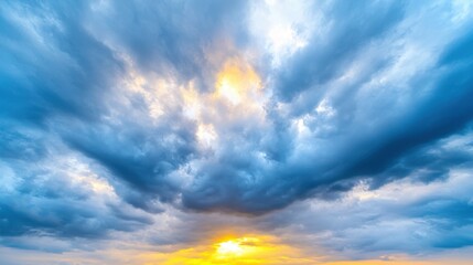 Obraz premium A blue sky with a sun shining through the clouds