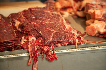 Cecina from Oaxaca. Mexican sliced cured pork or beef meat from Oaxaca displayed in a butcher shop...