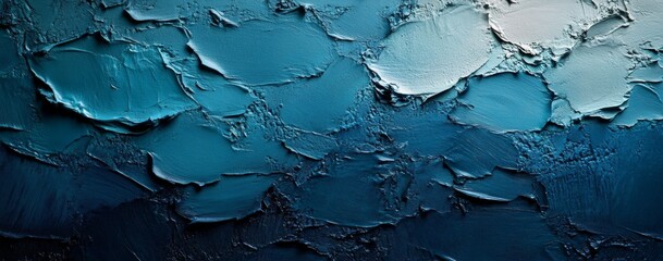 The painting is a blue and white abstract piece with a lot of texture