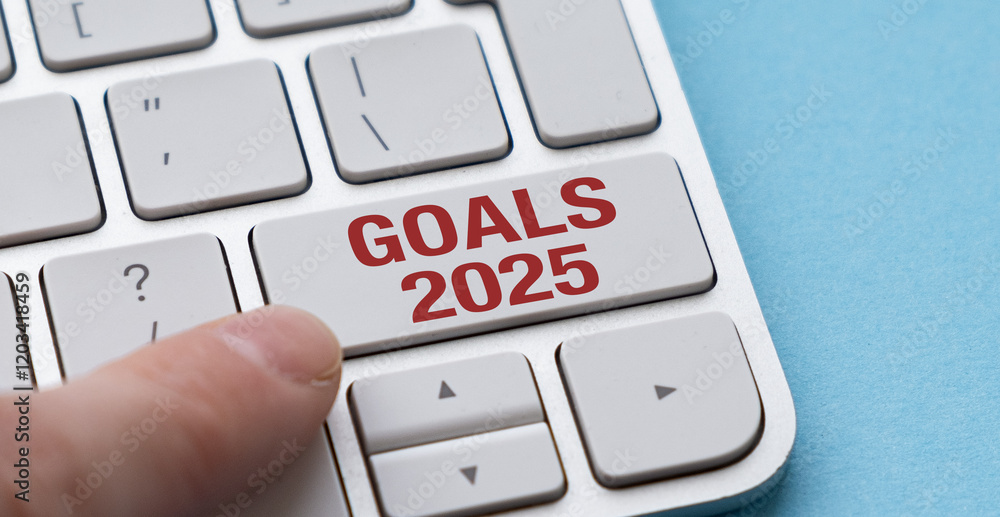 Poster the index finger is directed to the keyboard button with the text goals 2025