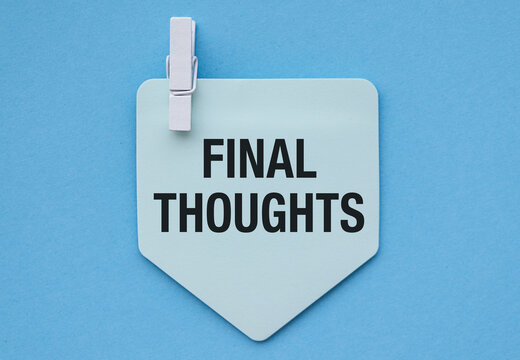 Final Thoughts words written on blue paper piece with blue background. Conceptual final thoughts symbol.