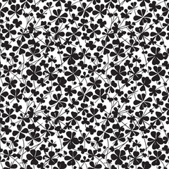 Black clover leaves on white background. St.Patrick 's Day. Isolated on white background. Abstract graphic black-white stock illustration. Template for coloring, textures and another design.