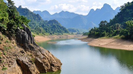 Obraz premium Serene River Landscape in Mountain Valley