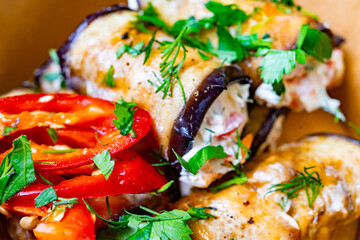 Delicious stuffed eggplant rolls with fresh herbs and tomatoes