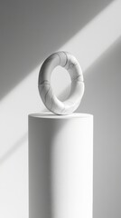 Modern minimalist accessory with artistic curves, photographed cleanly on a white round pole, editorial and sophisticated.