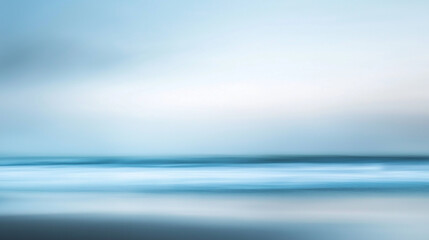 Fototapeta premium Seascape Abstract Beach with Calm Sea Bokeh Light and Sand Foreground