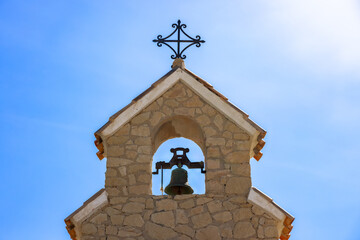Small chapel tower with bell inside