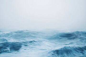 Fototapeta premium Mysterious ocean waves embrace the horizon under a blanket of fog on a calm, cool morning. Generative AI