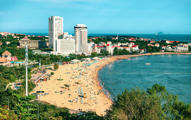 Fototapeta premium The view of the beach and coastline of Qingdao, China in summer