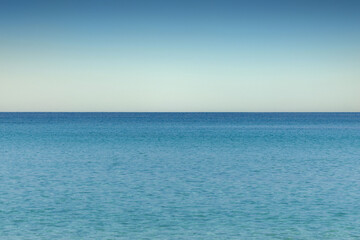 Obraz premium An Stunning beautiful sea landscape beach with turquoise water with copy space for your text. Beautiful turquoise water. ach with turquoise water. Beautiful tropical beach with blue sky and white clou