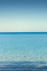 An Stunning beautiful sea landscape beach with turquoise water with copy space for your text. Beautiful turquoise water. ach with turquoise water. Beautiful tropical beach with blue sky and white clou