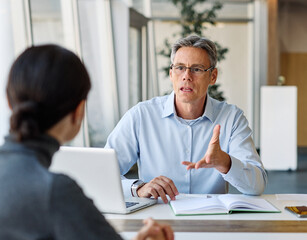 business meeting businesswoman woman office entrepreneur teamwork colleague businessman man businessperson startup creative  woman smart sitting latina black mid aged