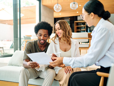 contract woman man signing couple investment house agent real estate business agreement client office home property meeting mortgage document insurance businesswoman