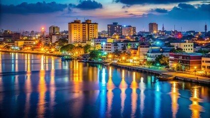 Fototapeta premium Cotonou Night Lights: Vibrant Cityscape at Dusk, Benin's Coastal Capital