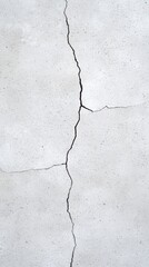 Fototapeta premium Close up view of a crack in a concrete wall revealing underlying texture and structure