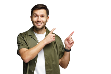 Person pointing to the sides with a smile, showcasing enthusiasm in a bright setting