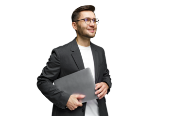 Young professional smiles confidently while holding a laptop in a stylish outfit indoors