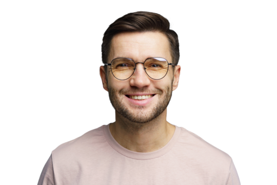 Smiling young man with glasses wearing a casual shirt in a bright indoor setting