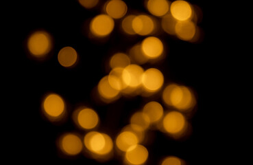 golden bokhe at night,Beautiful blurred light bokhe for background material.