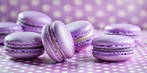 Obraz premium Delicious Lavender Macarons on Watercolor Purple Polka Dot Background - Sweet Treats Stock Photo