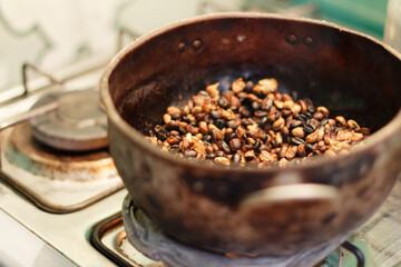 Home made roasted coffee in a rural kitchen. Tierradentro, Cauca, Colombia.
