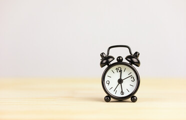 black alarm clock Time and reminder concept with copy space.