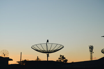 satellite dish at sunset