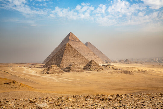 Egypt. Cairo - Giza. General view of pyramids from the Giza Plateau (three pyramids known as Queens' Pyramids on front side; next in order from left: the Pyramid of Menkaure, Khafre and Chufu