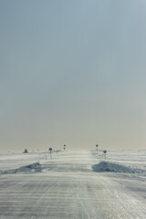 Blizzard accompanied by ground wind. Natirvik (blowing snows)