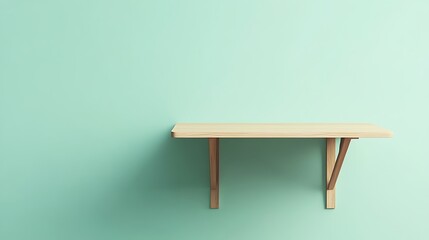 Fototapeta premium Space saving wall mounted folding desk on light green background