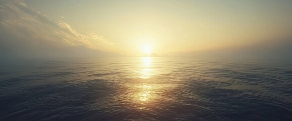 Obraz premium Serene ocean sunset with golden light reflecting on calm waters.