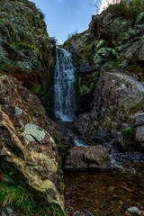 Lightspout Waterfall in Carding Mill Valley: Serene Landscape of Rocky Streams and Tranquil Falls
