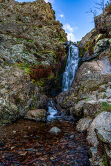 Lightspout Waterfall in Carding Mill Valley: Serene Landscape of Rocky Streams and Tranquil Falls