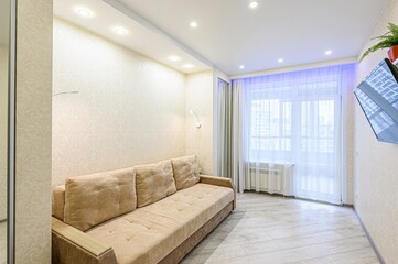 standard interior apartment. living room with sofa