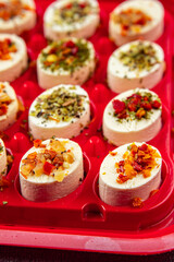 cheese appetizer soft cheese with herbs and tomatoes pieces fresh tasty food dish delicious gourmet food background on the table rustic food top view copy space
