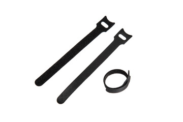 Three black hook-and-loop cable ties, two flat and one coiled, used for organizing and securing...