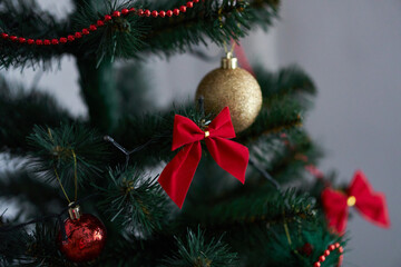 red decorations on the Christmas tree