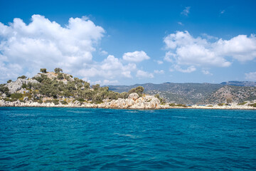 Naklejka premium Beautiful bay near Kekova island and Kas in Antalya province, Turkiye. Sunny summer in seaside. Turquoise water.