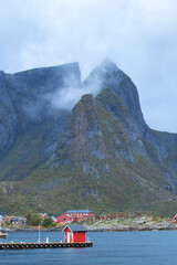 View over a fjord near Reine, Norway with Horn Mountain (Hammerskaft) Reine on Lofoten island chain...