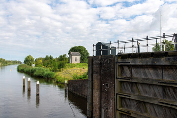 Wooden doors of the Benedensas lock complex at the mouth of the Steenbergsche Vliet near De Heen,...